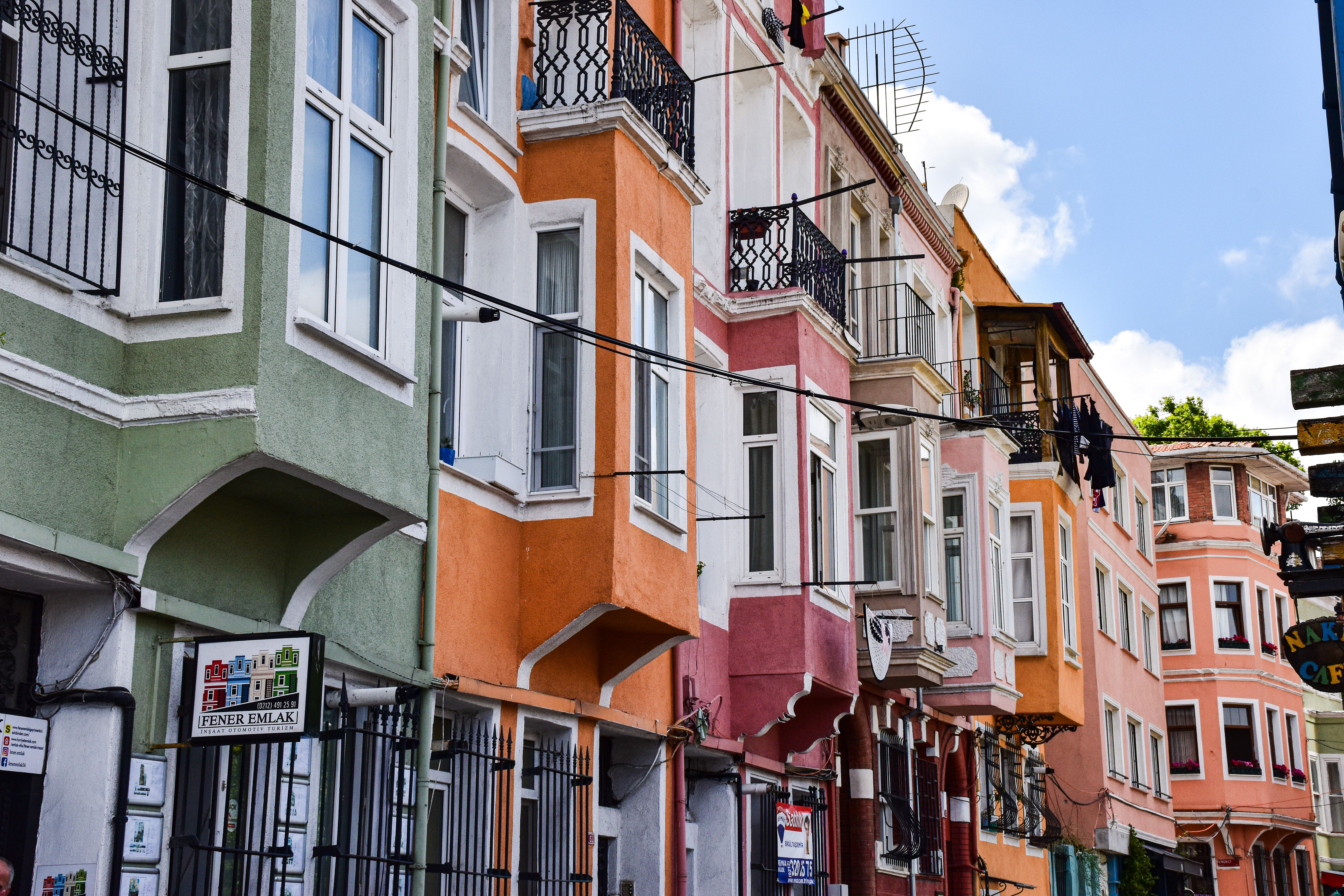 Vibrant traditional houses with colorful facades in Fener, Istanbul on a sunny day.