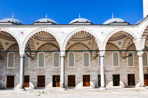 Free Intricate arches and domes exemplify Ottoman architecture at a historic site in Istanbul, Turkey. Stock Photo
