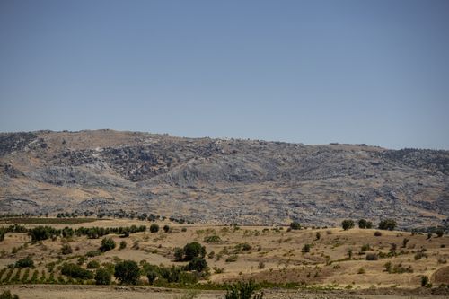 Free Explore the rugged beauty of Çermik, Türkiye's arid landscape with vast hills and valleys. Stock Photo