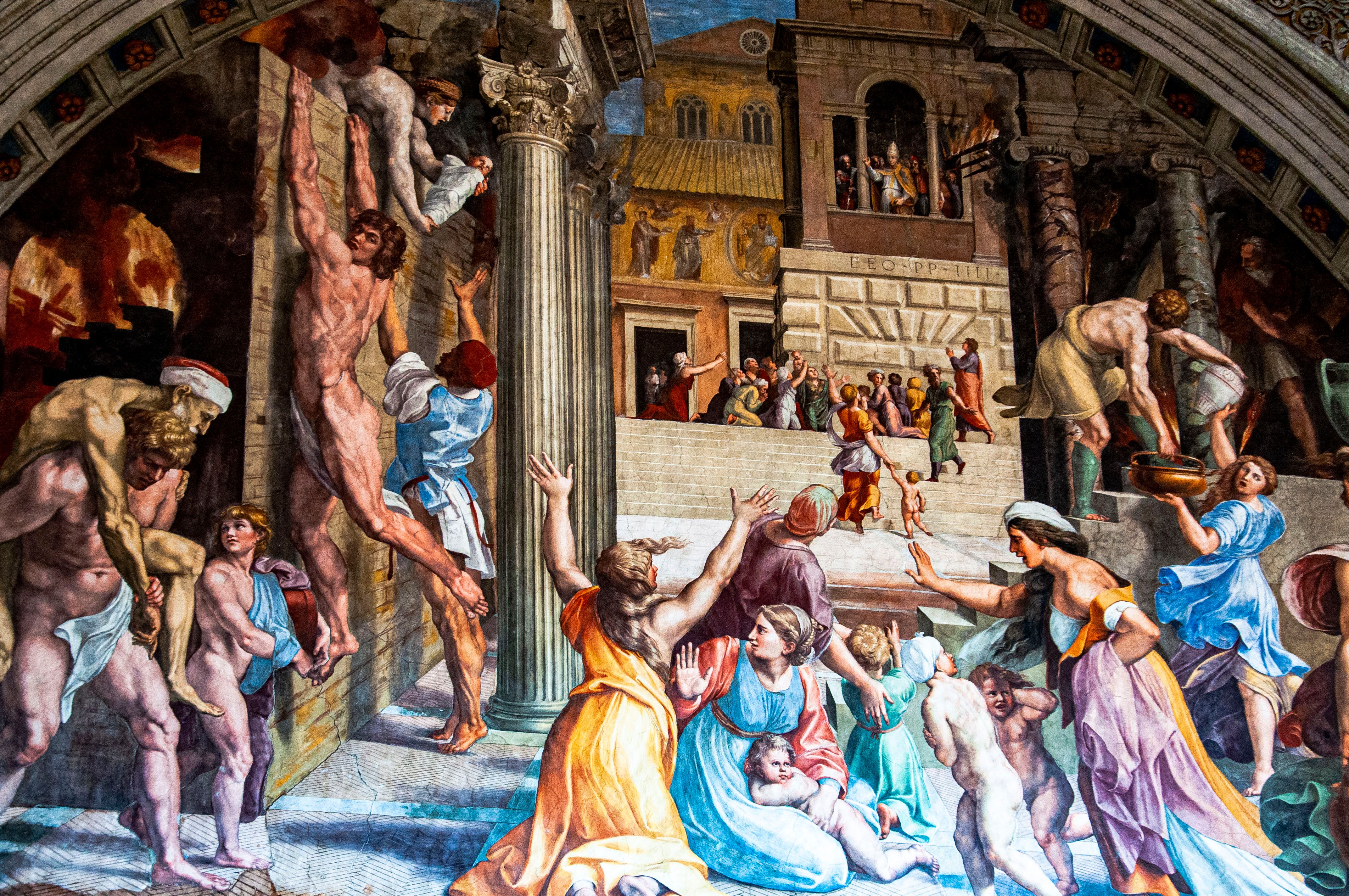 Detailed Renaissance fresco depicting religious scenes in Vatican City.