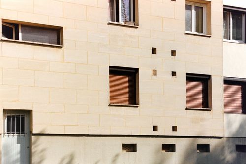 Free Facade of a modern building in Compiègne, showcasing geometric design and urban architecture. Stock Photo
