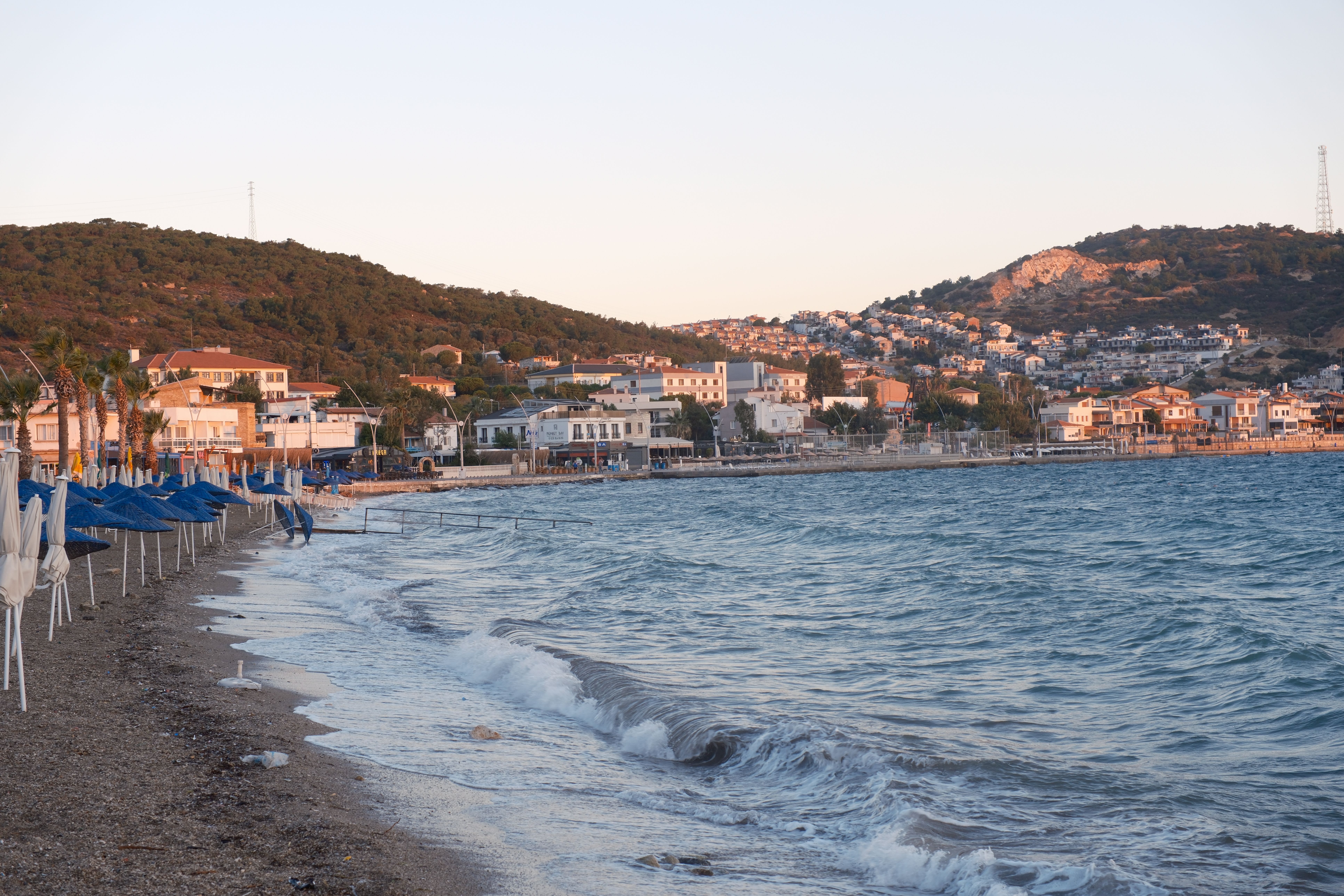 Breathtaking sunset over the coastal town of Foça, İzmir, Türkiye.