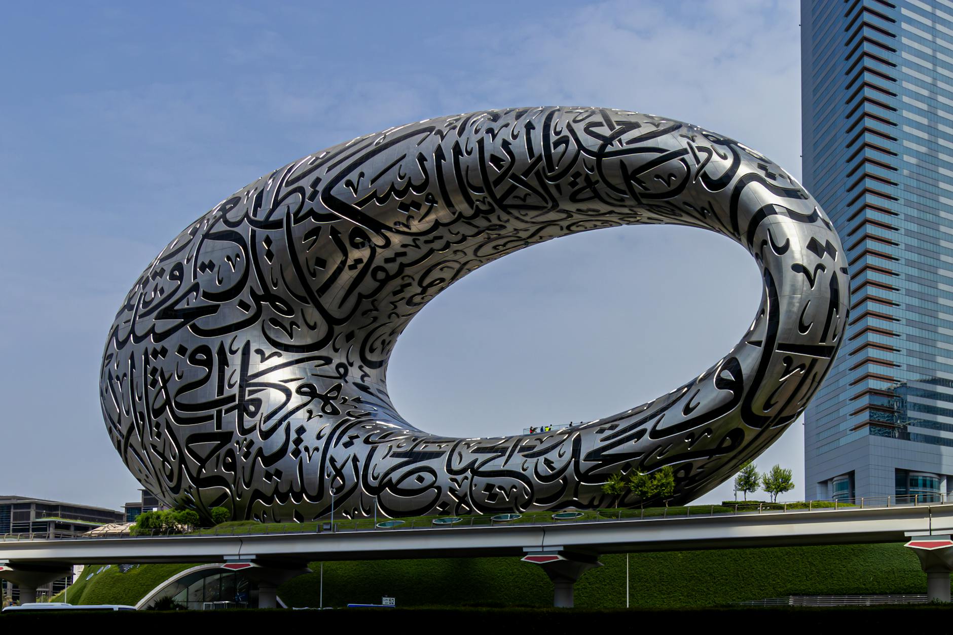 Stunning view of the Museum of the Future in Dubai, an architectural marvel with Arabic calligraphy.