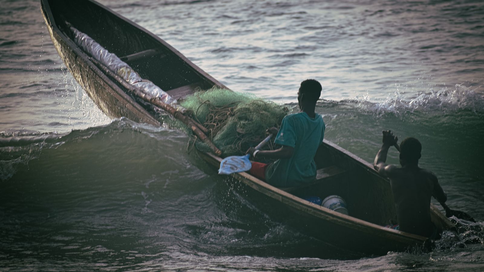 Two people in a boat, Sao Tome and Principe