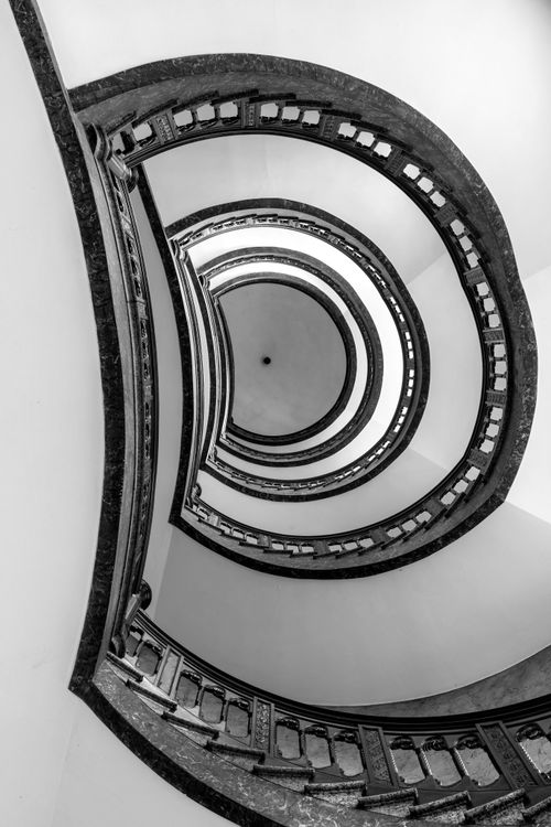 Free Intricate spiral staircase captured in black and white in Hamburg. Stock Photo