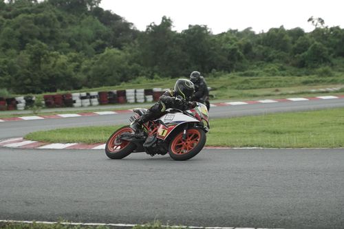 Free An exhilarating motorcycle race captured at the Tarlac City track, featuring intense cornering action. Stock Photo