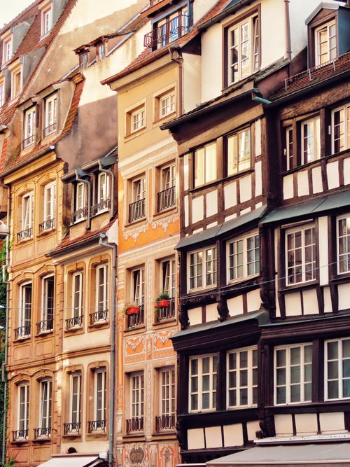 Free A picturesque view of traditional half-timbered buildings in a European city, capturing architectural beauty. Stock Photo