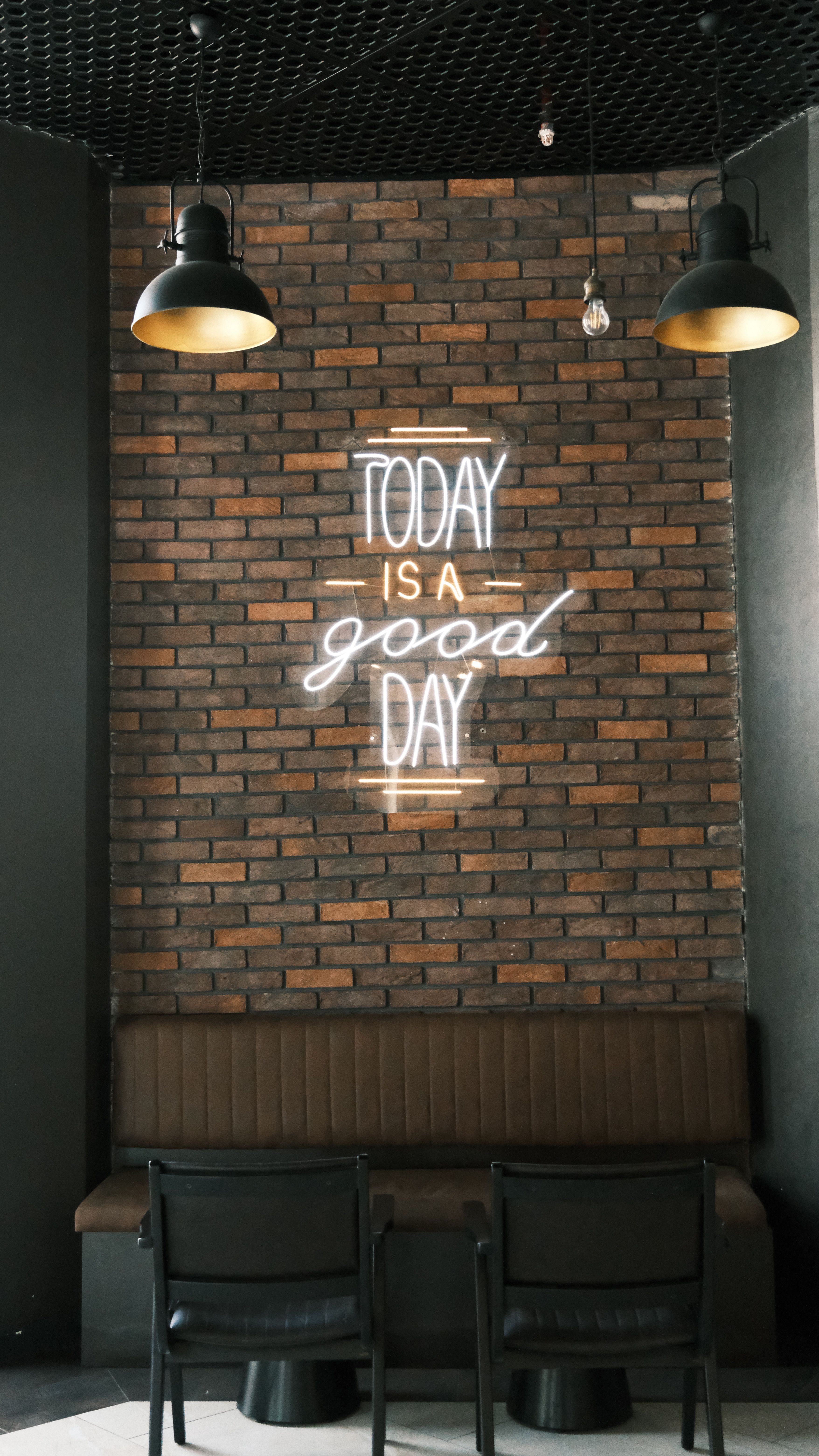 A brick wall with a neon sign that says today is a good day · Free ...