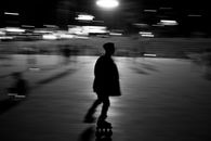 Monochrome Photo of Person Roller Skating