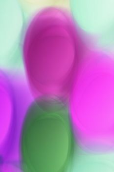 Vibrant abstract art with blurred colorful bokeh lights creating a dreamy effect.