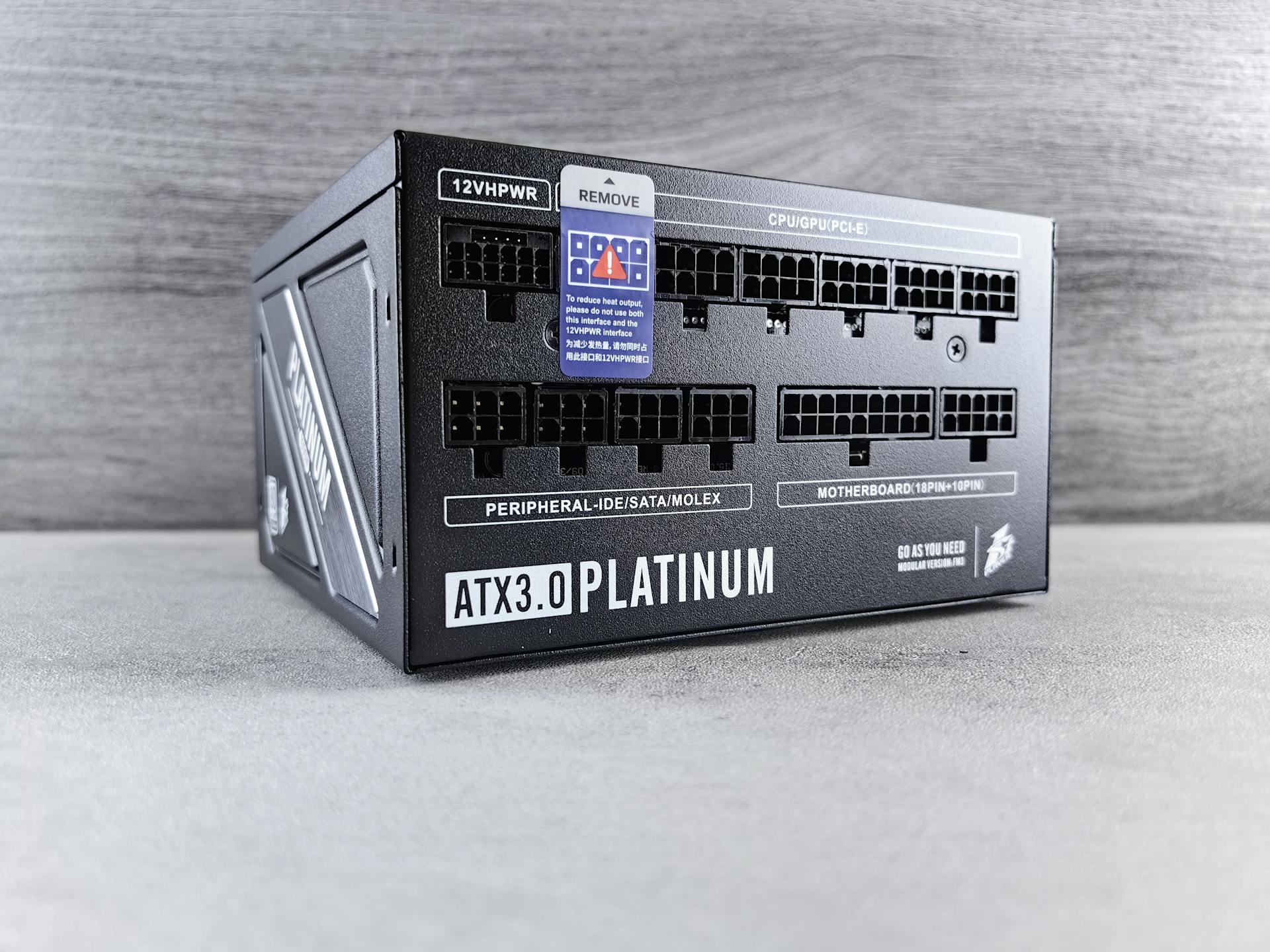 High-quality ATX3.0 platinum power supply unit with visible modular connections for electronics setup.