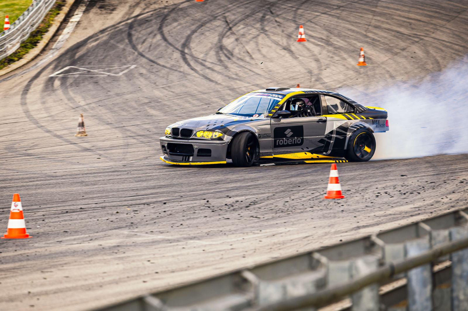 A Race Car Drifting at a Race Track · Free Stock Photo