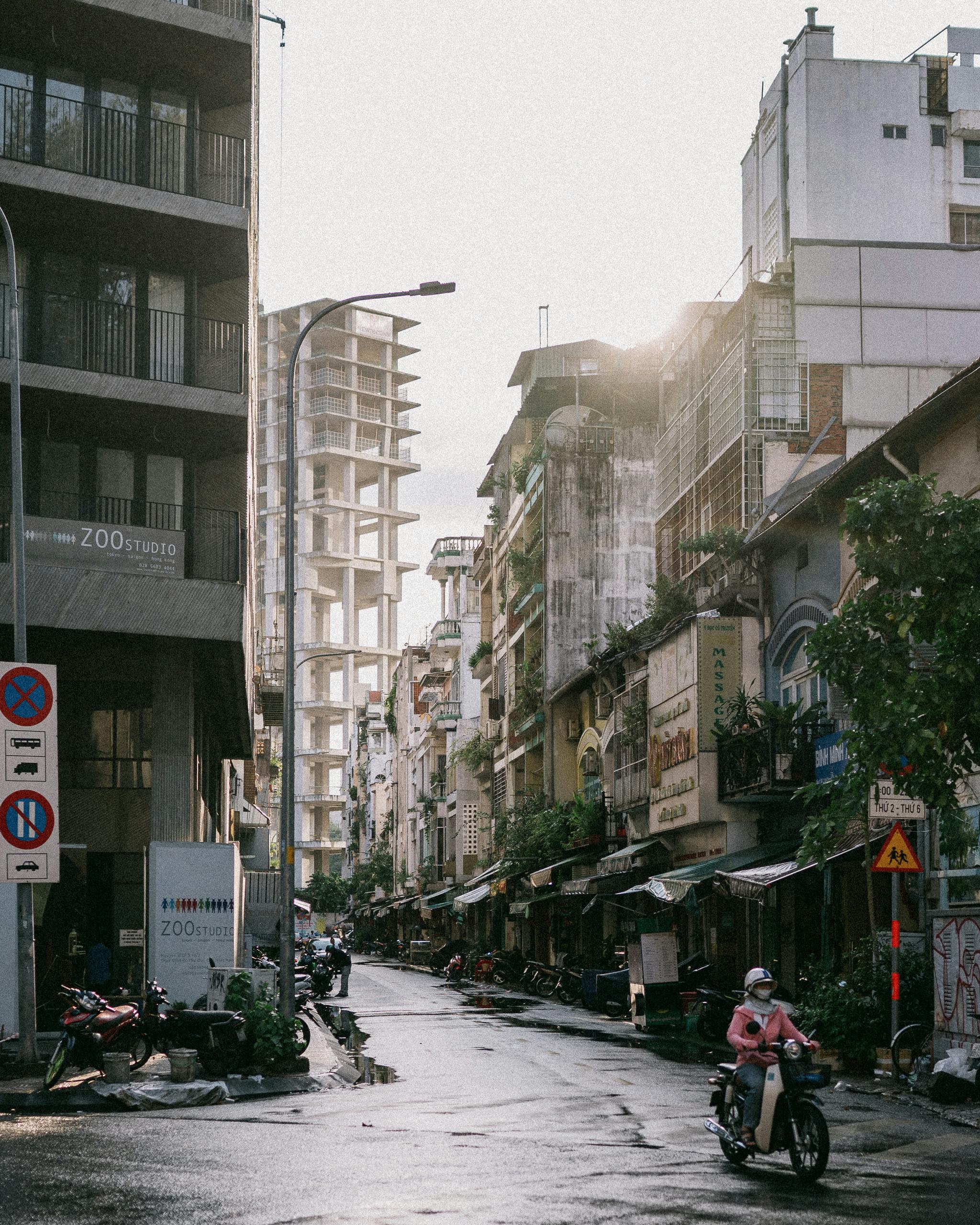 Dynamic street scene capturing the essence of urban life in Ho Chi Minh City, Vietnam.