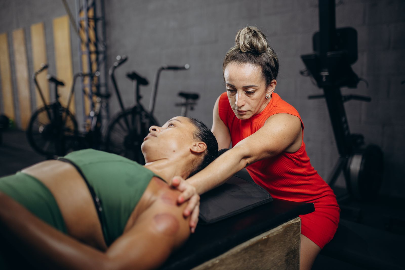 Person foam rolling their leg muscles as part of an active recovery routine