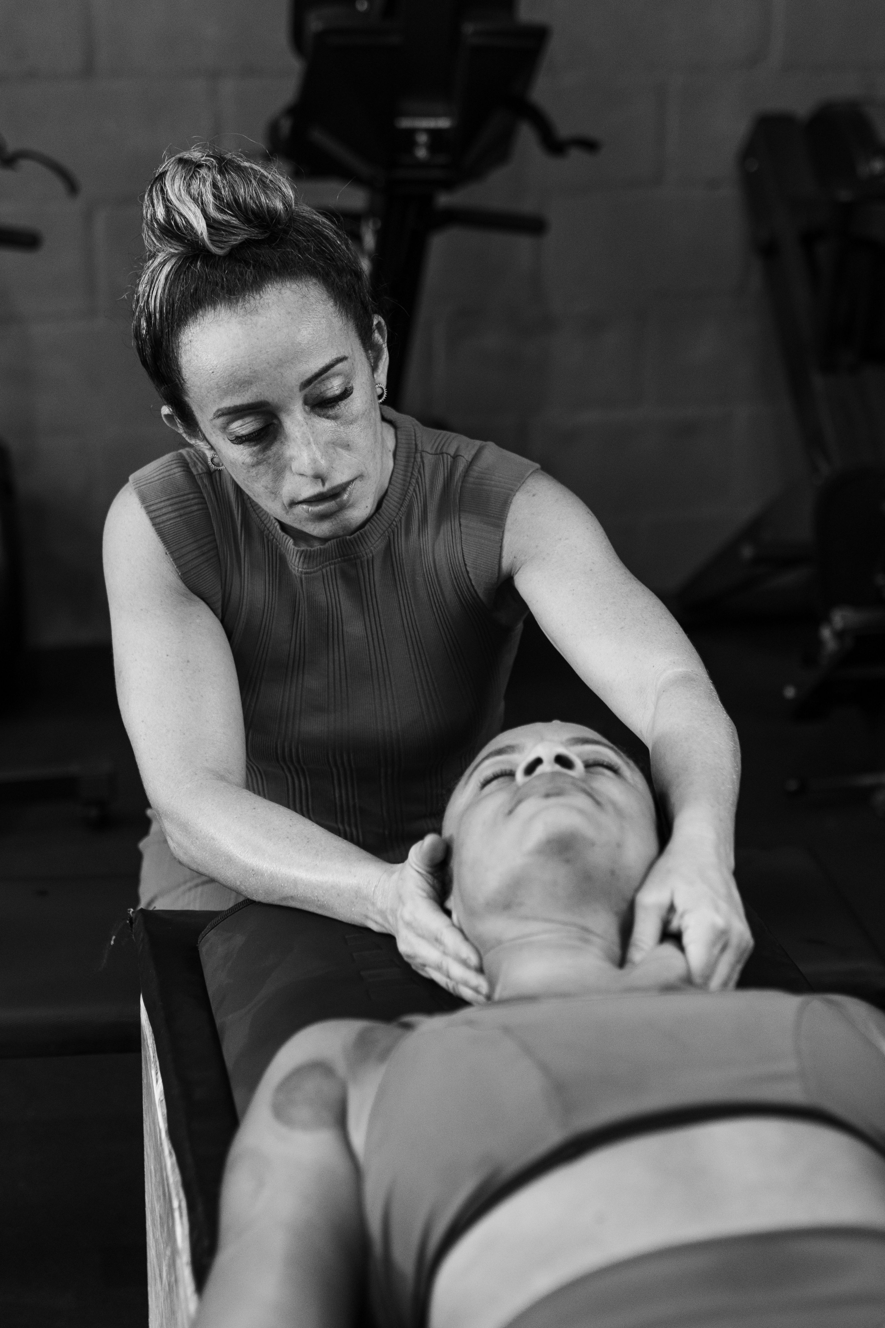 Manual therapy session in a sports recovery environment — illustrative Pexels photograph, not a named Bangkok operator