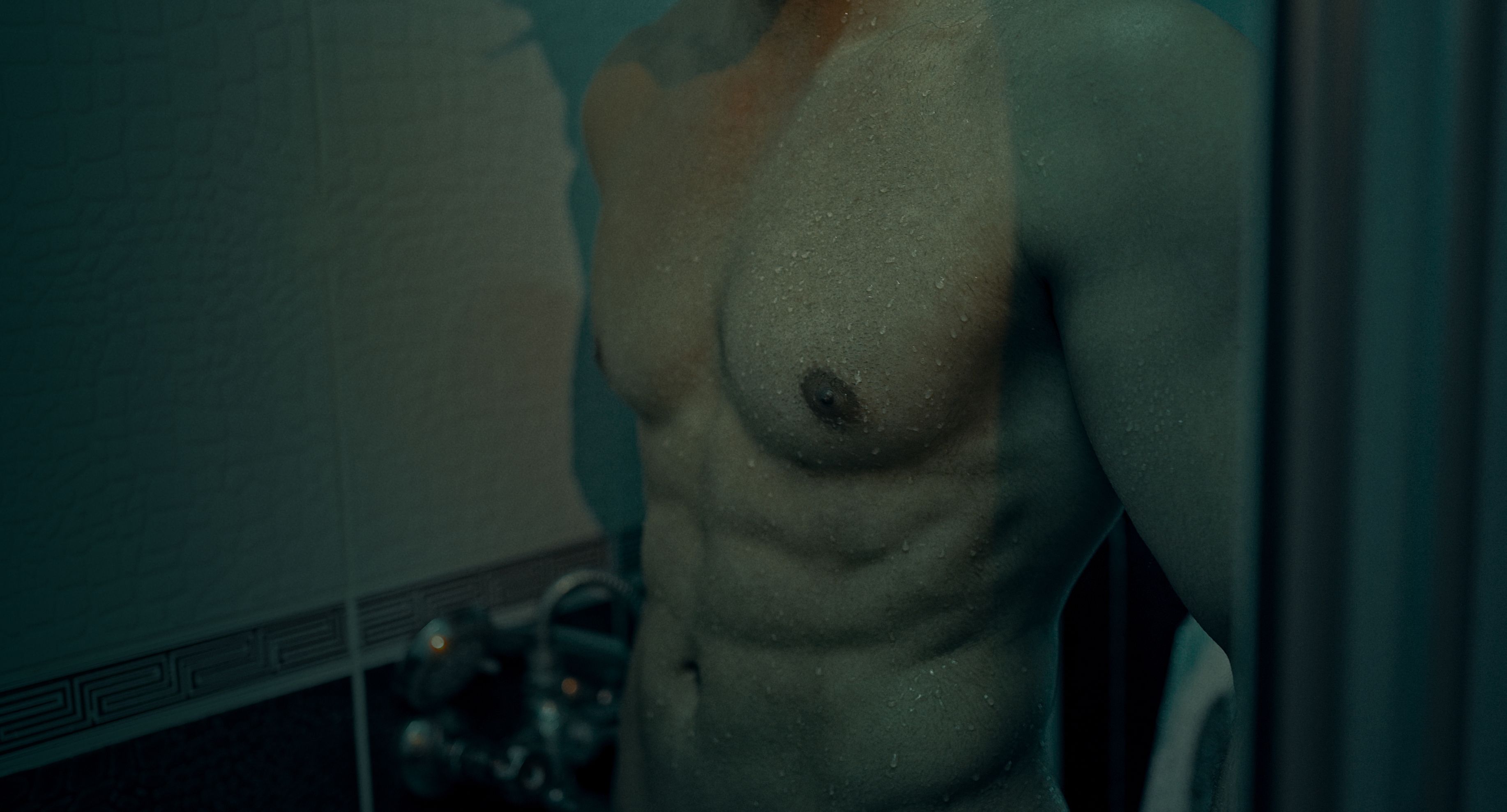 Athlete using cold shower for recovery and cold exposure therapy