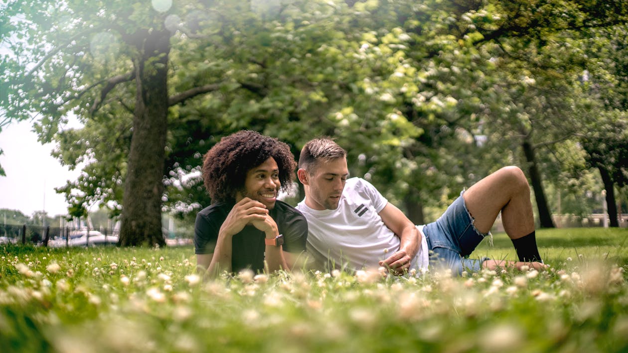 Men Lying on Grass