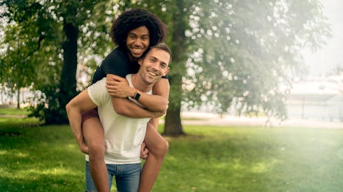 Free Photo Of Men Hugging Each Other Stock Photo