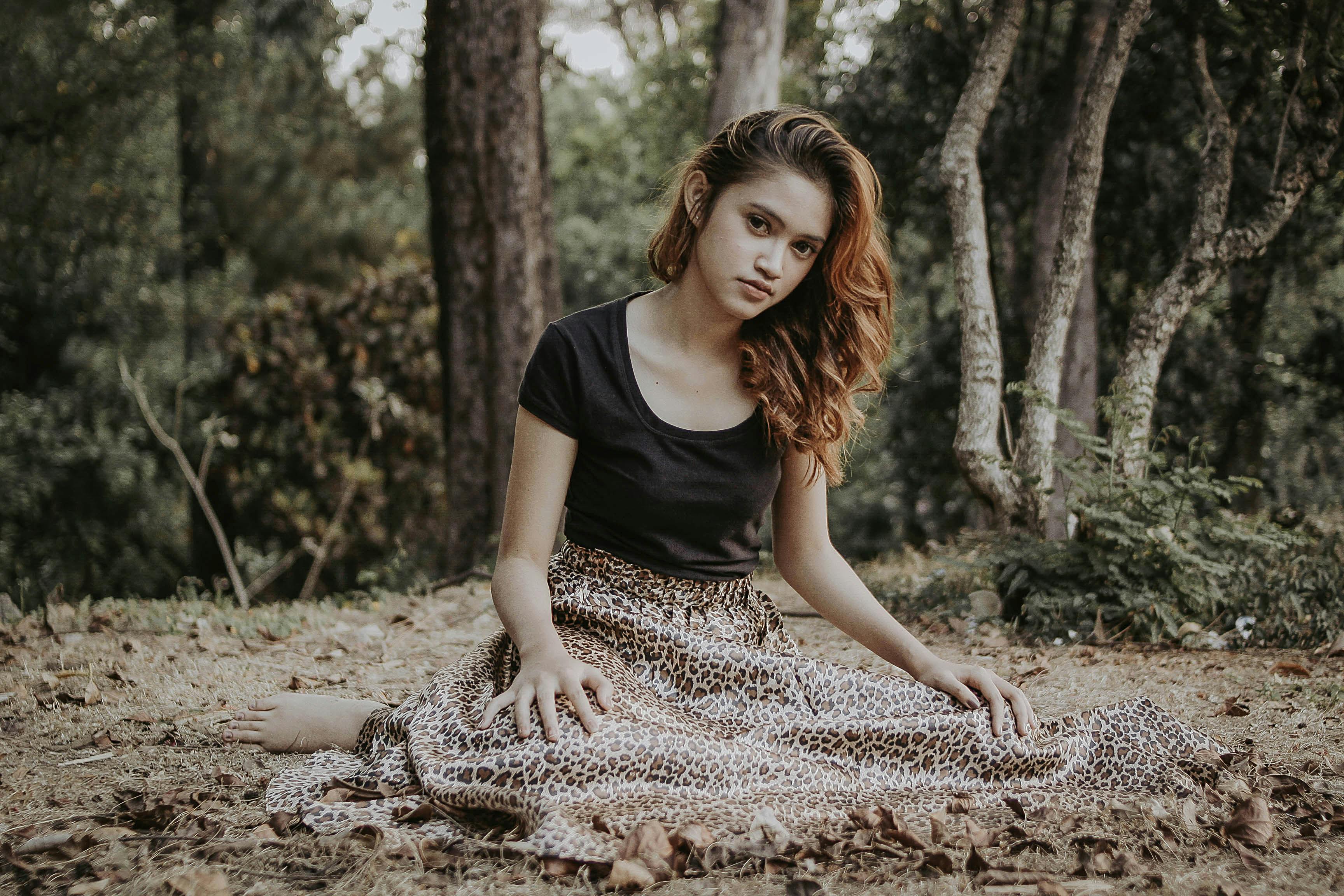 Woman Sitting and Posing in White Dress · Free Stock Photo