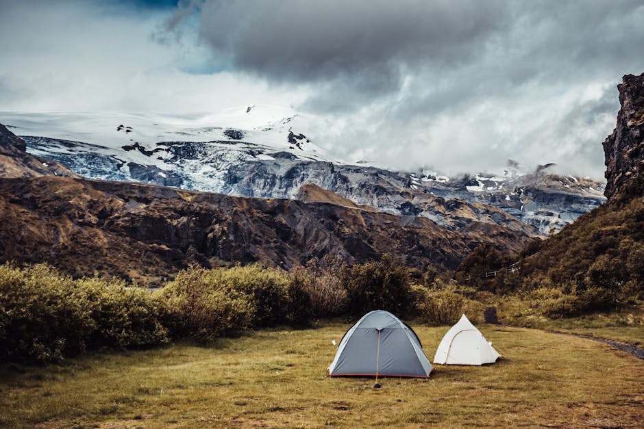A hiker prepares for a camping trip in the outdoors.