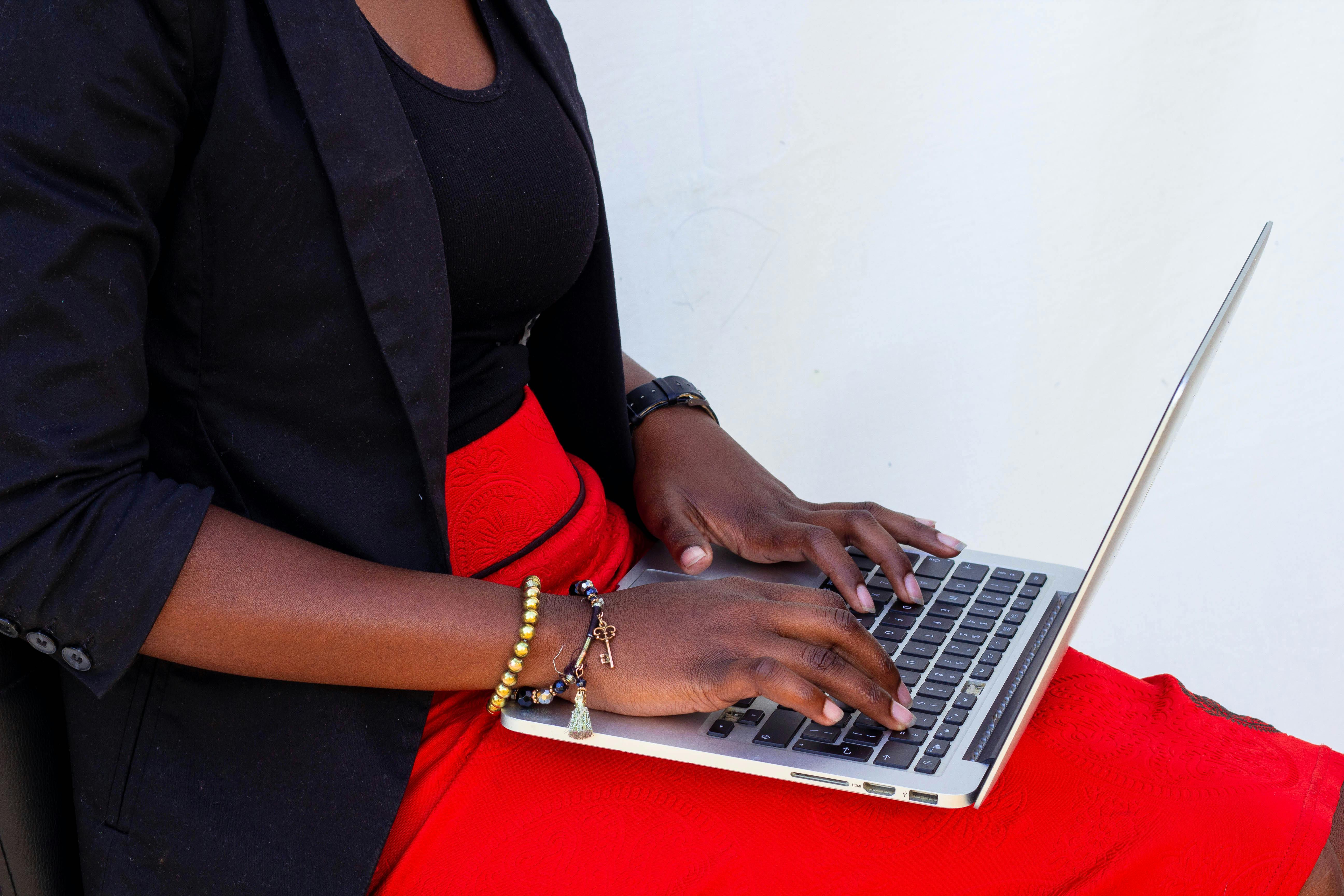 Photo of Woman Using a Laptop