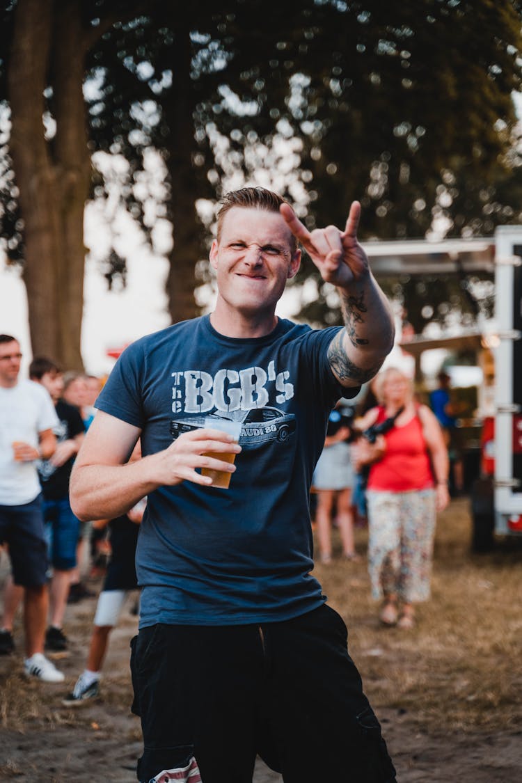 Man Doing Rock And Roll Sign