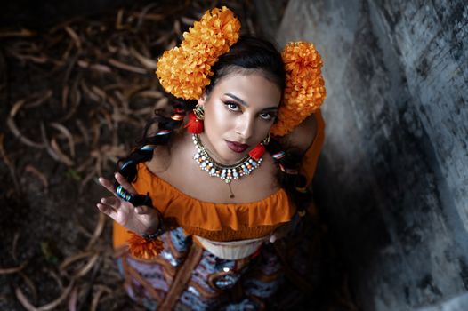 Striking portrait of a woman in traditional attire with floral headpiece, Lisbon.