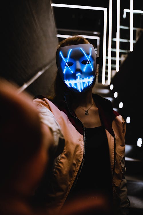 Free Person Wearing Light Up Mask Stock Photo