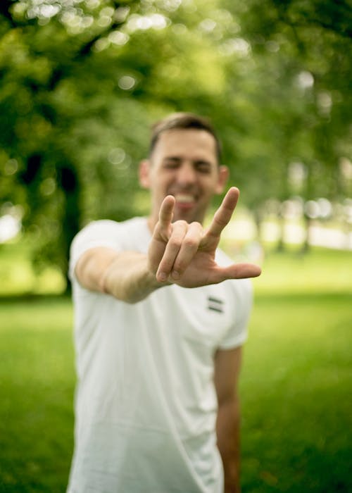 Photo Of Man Making Hand Sign