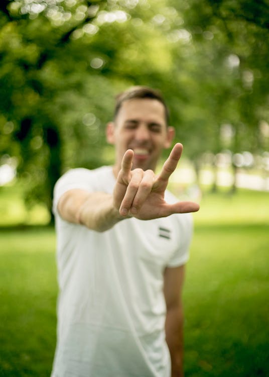 Free Photo Of Man Making Hand Sign Stock Photo