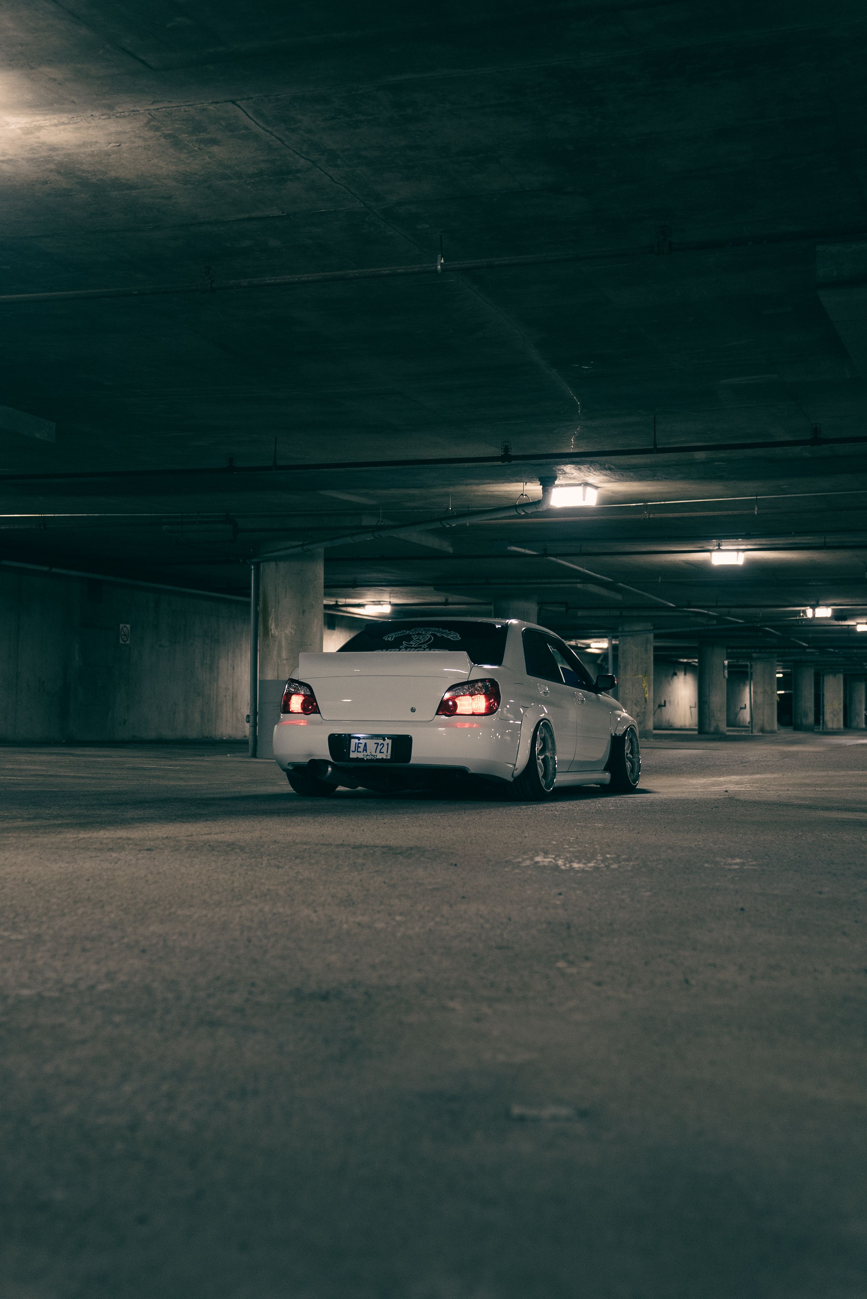 BMW Car Parked at Night in Urban Alleyway · Free Stock Photo
