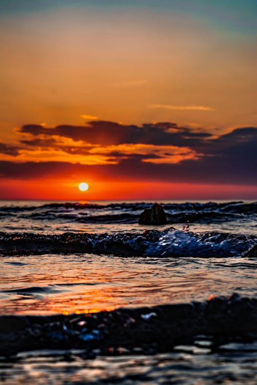 Gratis Foto Panoramica Di Oceano Durante L'alba Foto a disposizione