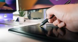 Prints laid out in a studio — photo by Jakub Zerdzicki on Pexels