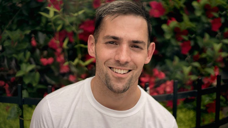 Photo Of Man Wearing White Shirt