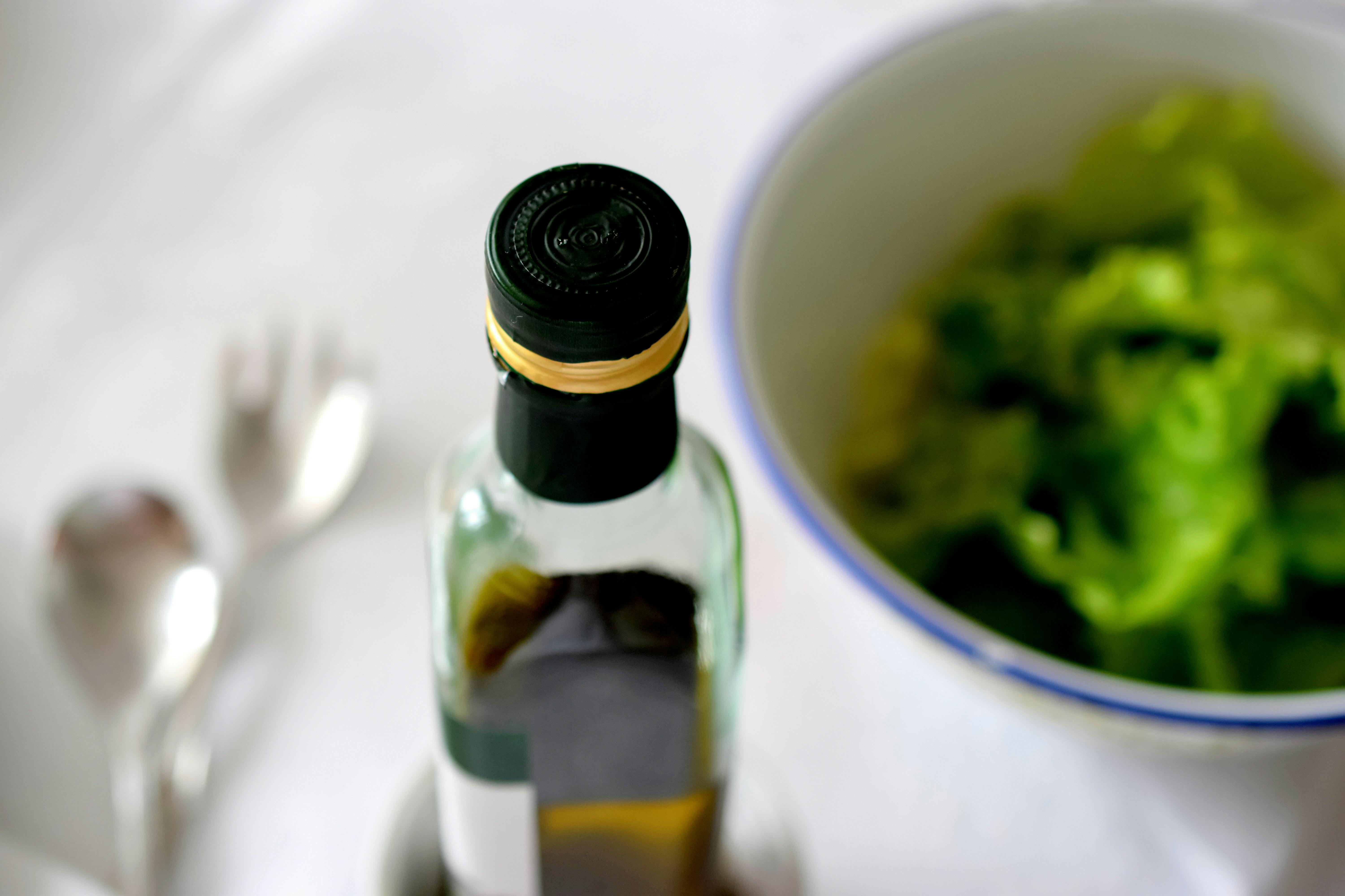 Bottled Salad Dressing On Fresh Greens