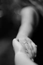 Person touching hand of other person