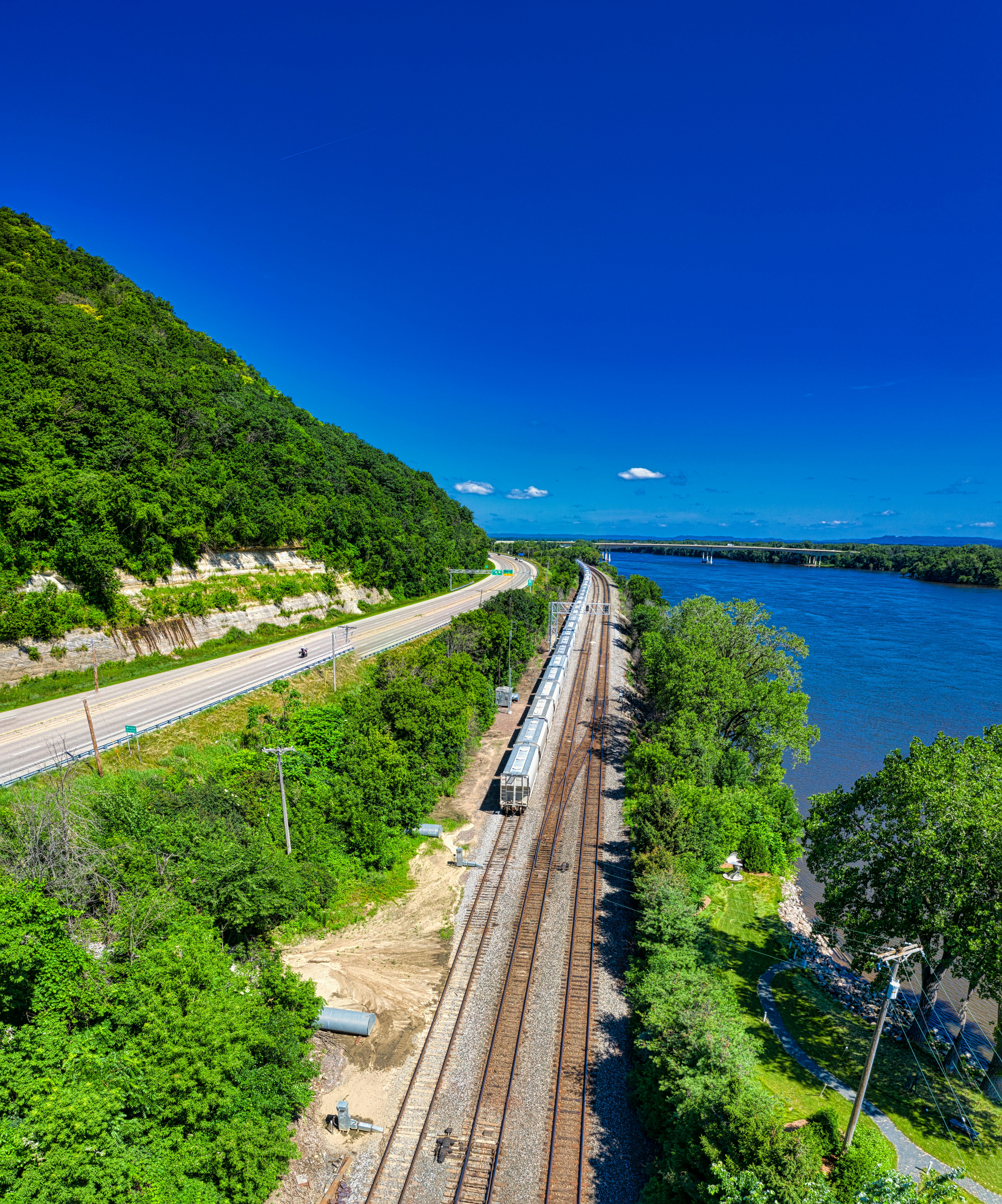 train railway beside body of water