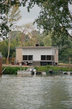 Idyllic riverside home surrounded by lush greenery, perfect for a tranquil escape.