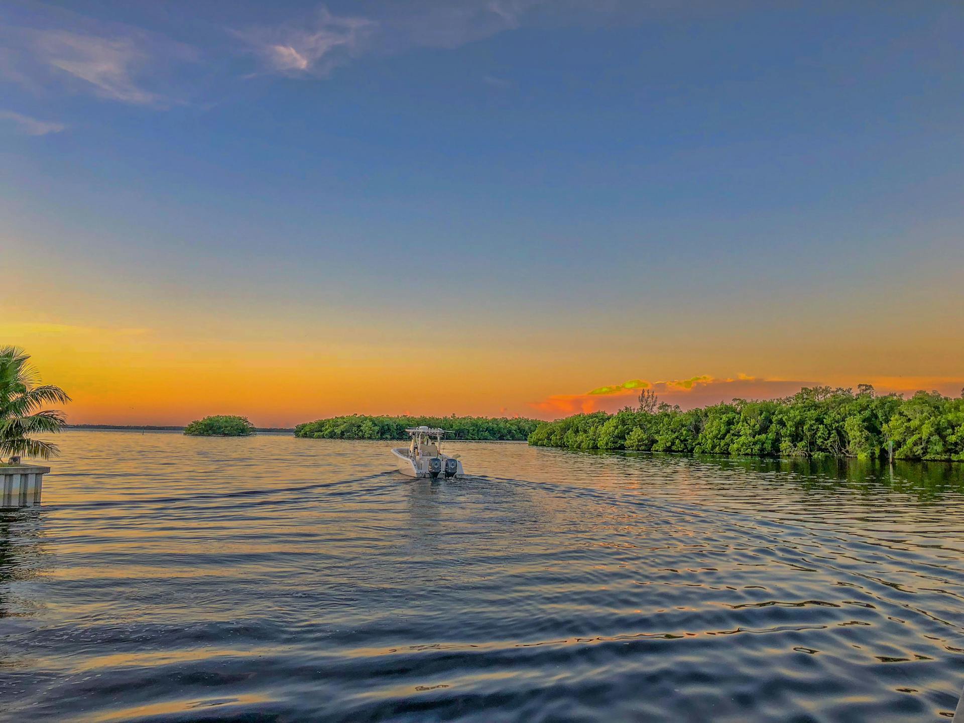 Photo of Boat on Body of Water
