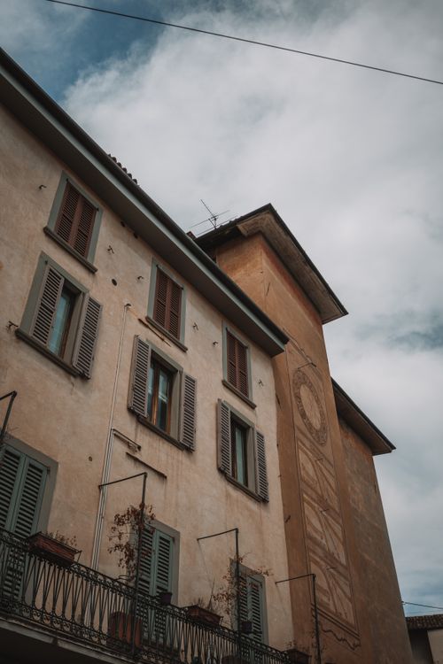 Free A classic facade of a building in Bergamo, Italy showcasing traditional Italian architectural elements. Stock Photo