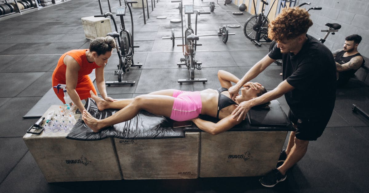 Athlete receiving a deep tissue massage on their leg.