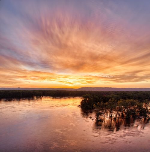 Free A breathtaking sunset over Reads Landing on the Mississippi River in Minnesota, USA. Stock Photo