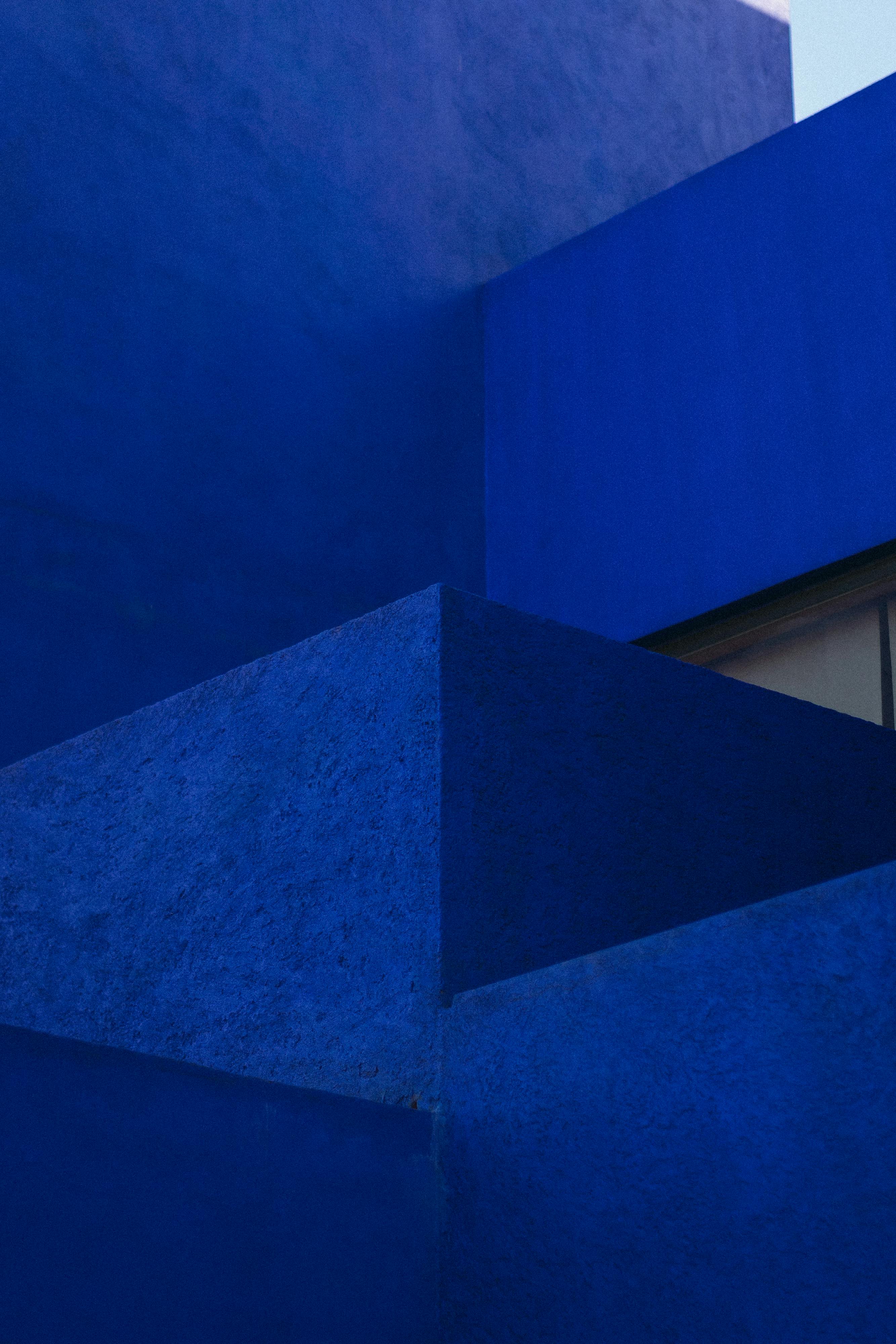 Striking abstract architectural photo with bold blue geometry in Puebla, Mexico.