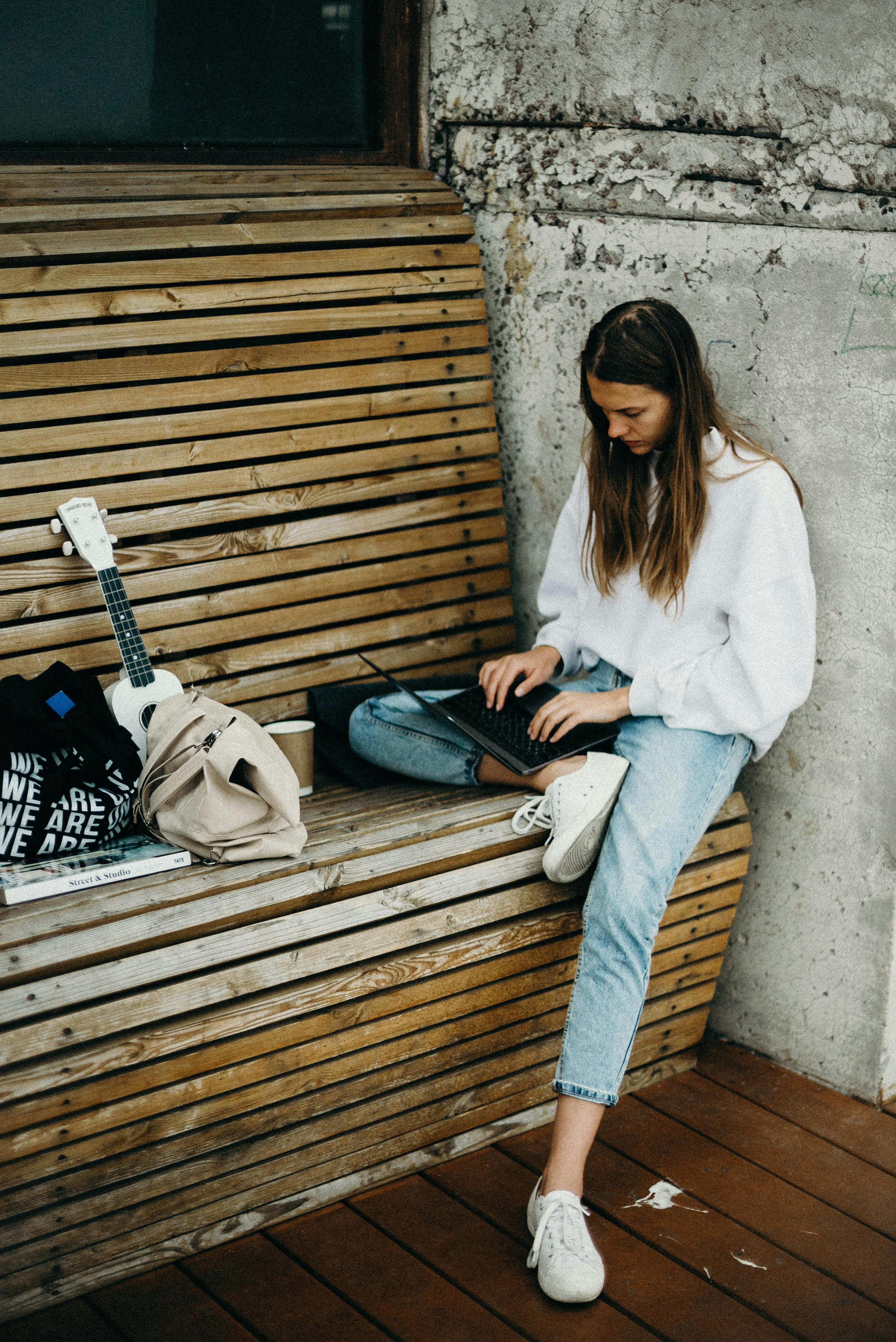 Woman Sitting on Bench