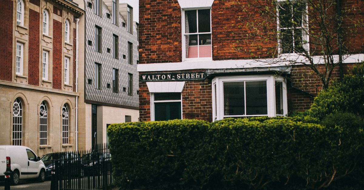 Street view of Walton Street showcasing traditional architecture in Oxford, England.