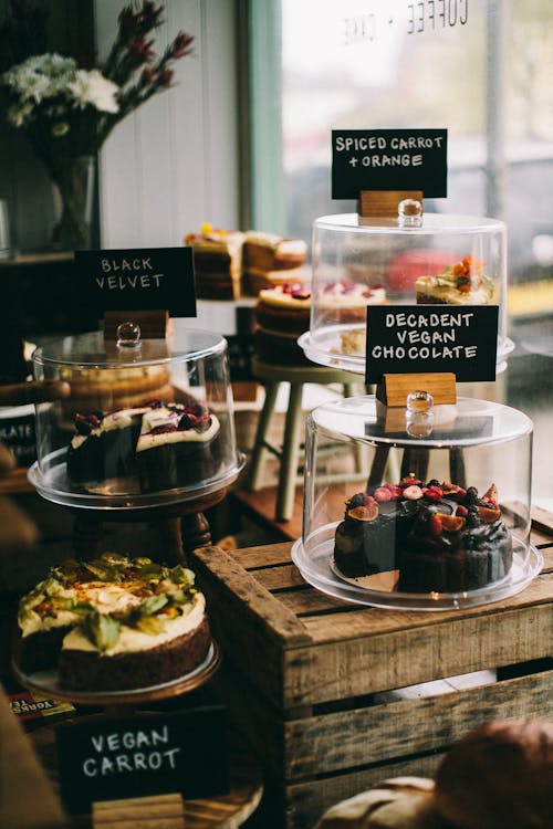 Close-Up Photo Of Cakes Near Glass Window