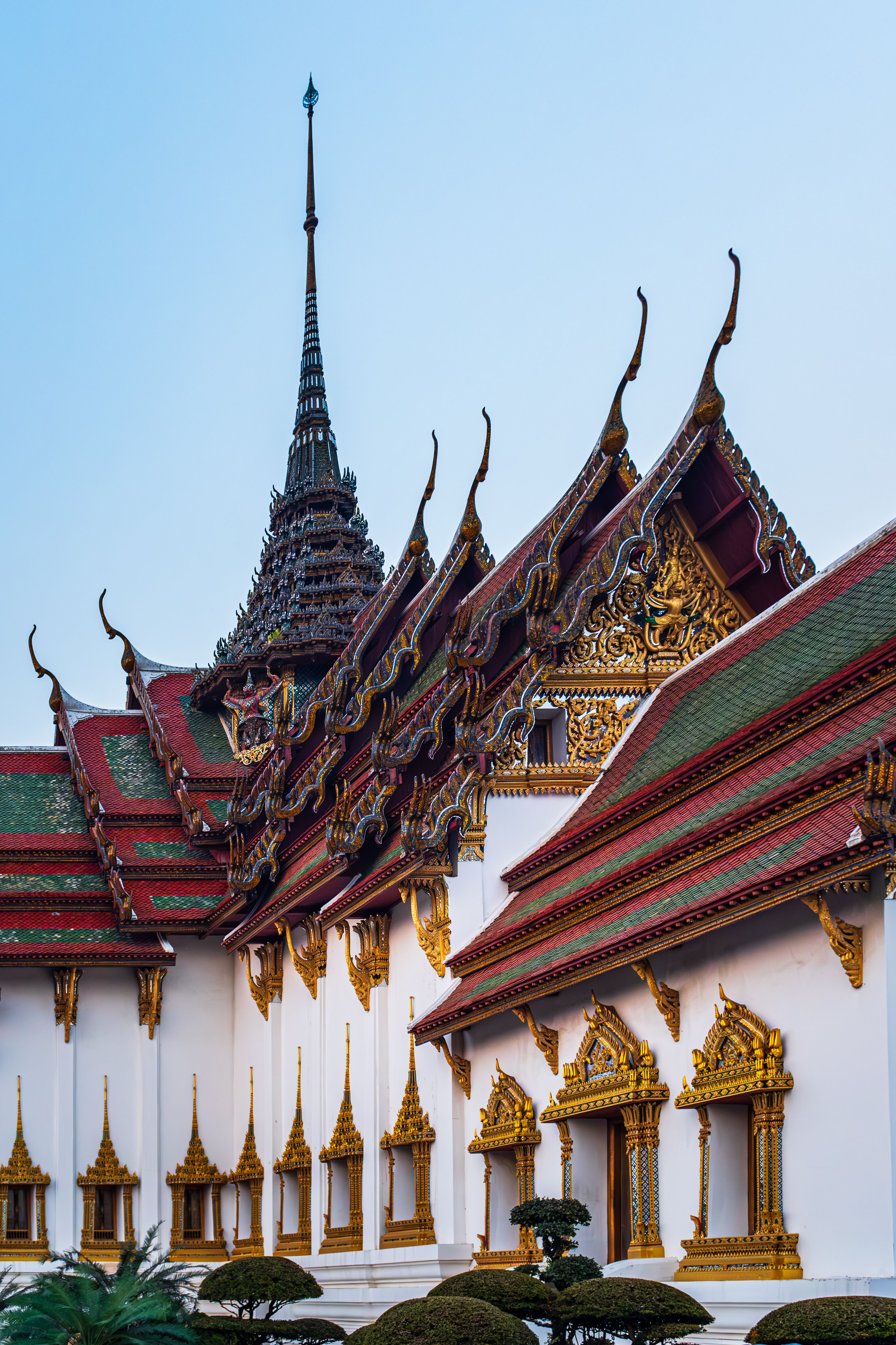Exquisite Buddhist temple with intricate details in Bangkok, Thailand, showcasing traditional Thai architecture.