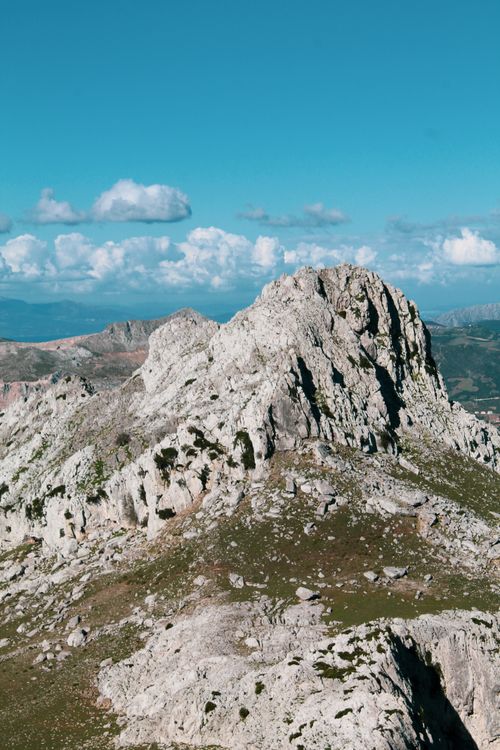 Free Explore the rugged beauty of a Moroccan mountain peak under clear skies. Stock Photo