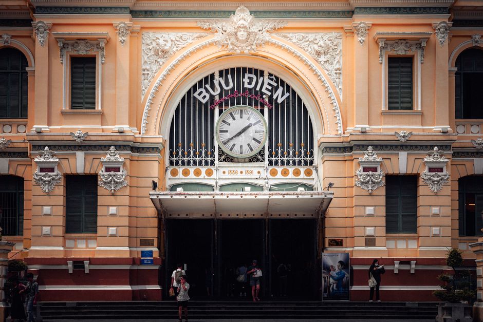 Explore the ornate facade of Ho Chi Minh City's historic Central Post Office, a symbol of Vietnamese culture and architecture.