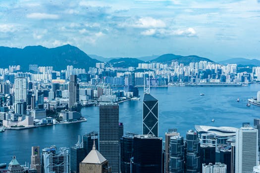 Explore the majestic Hong Kong skyline with its iconic skyscrapers and vibrant harbor.